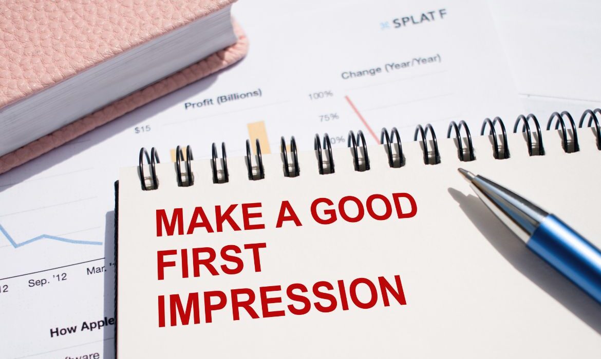 notebook with text "make a good first impression"