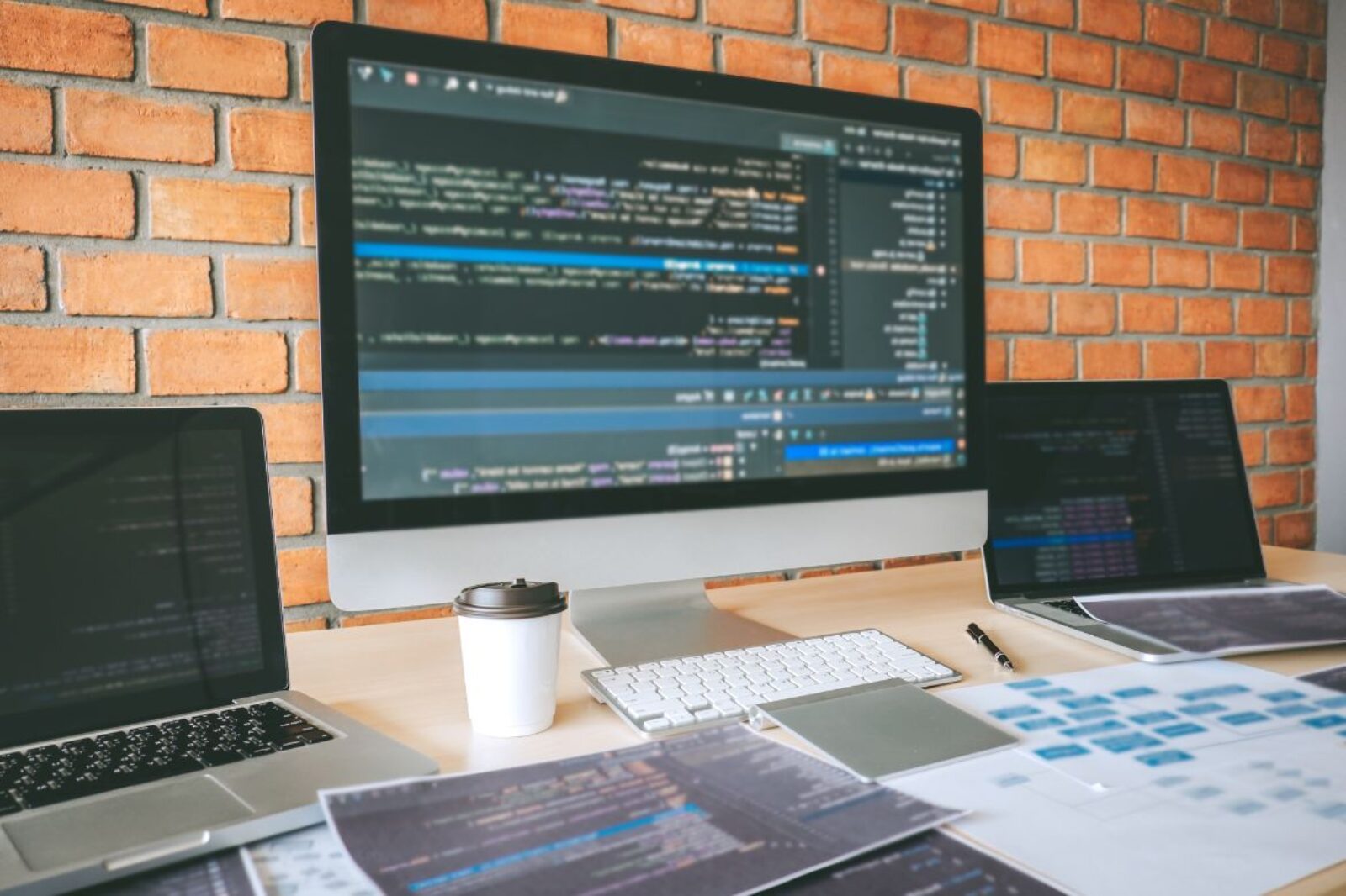 Macbook screen with computer html code