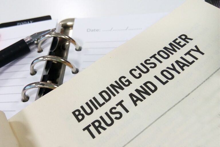 piece of paper with text "how to build trust"
